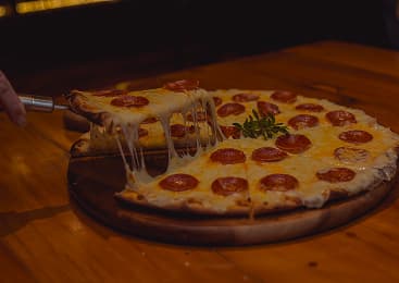 Chef cooking pizza